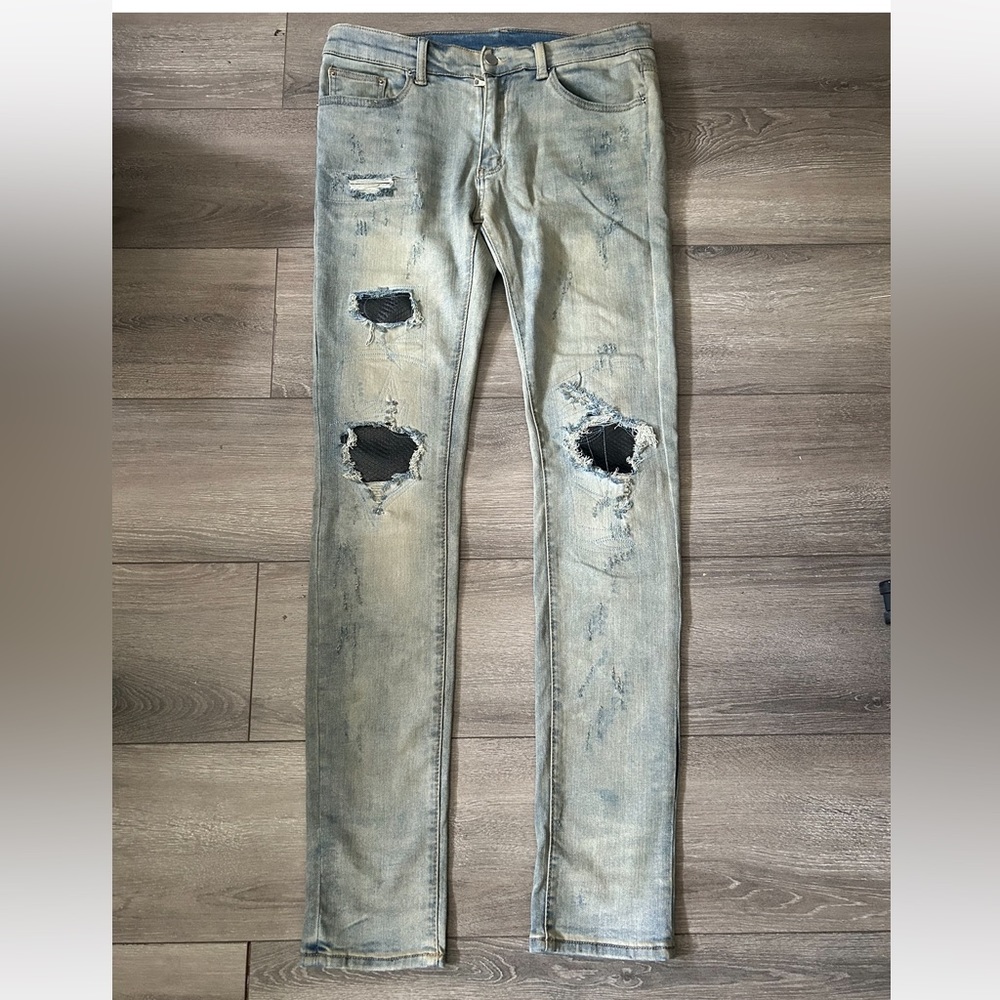 Mnml distressed patched jeans